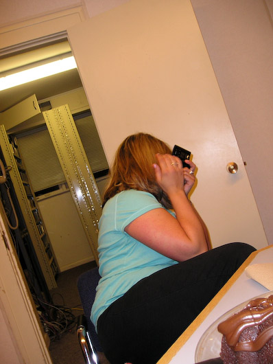 Heather trying to not get her picture taken...